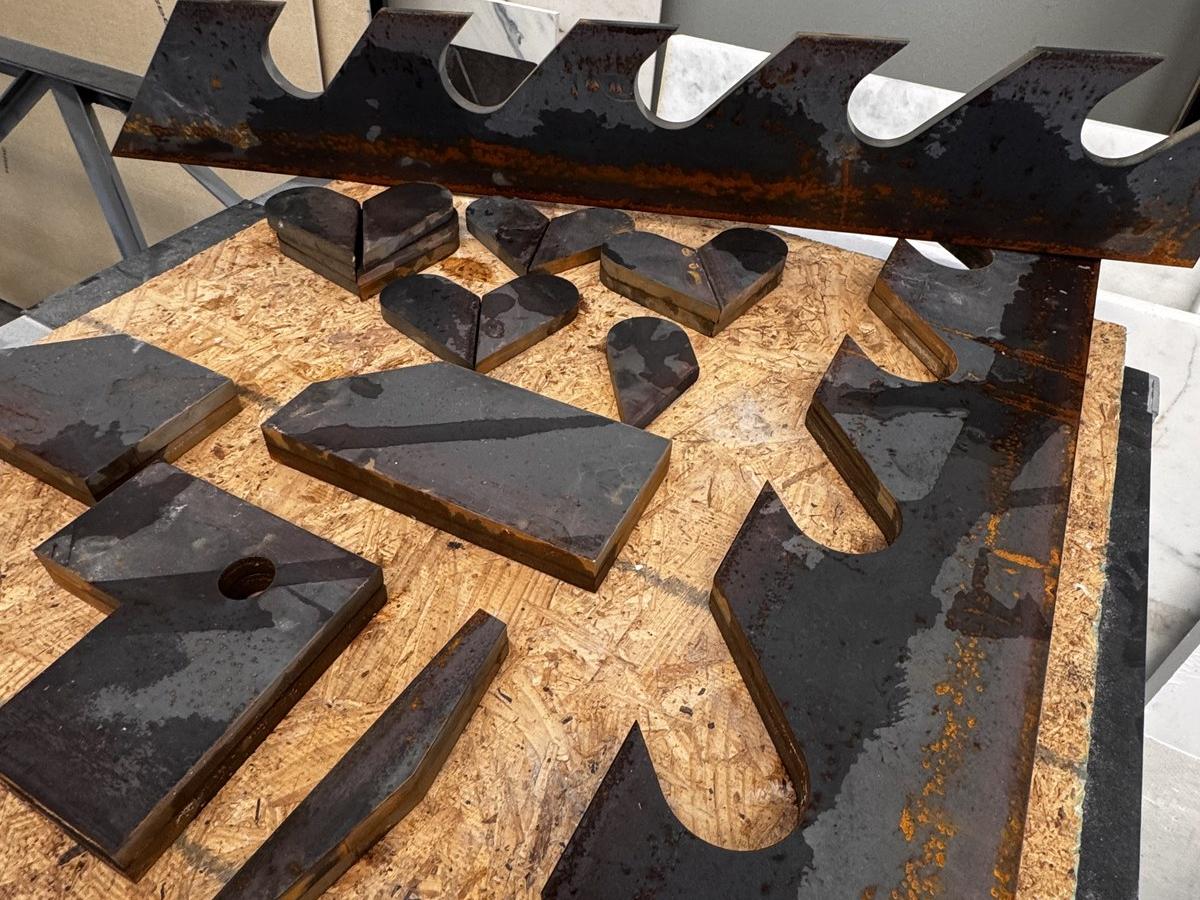 Decorative metal heart shapes precision-cut by waterjet