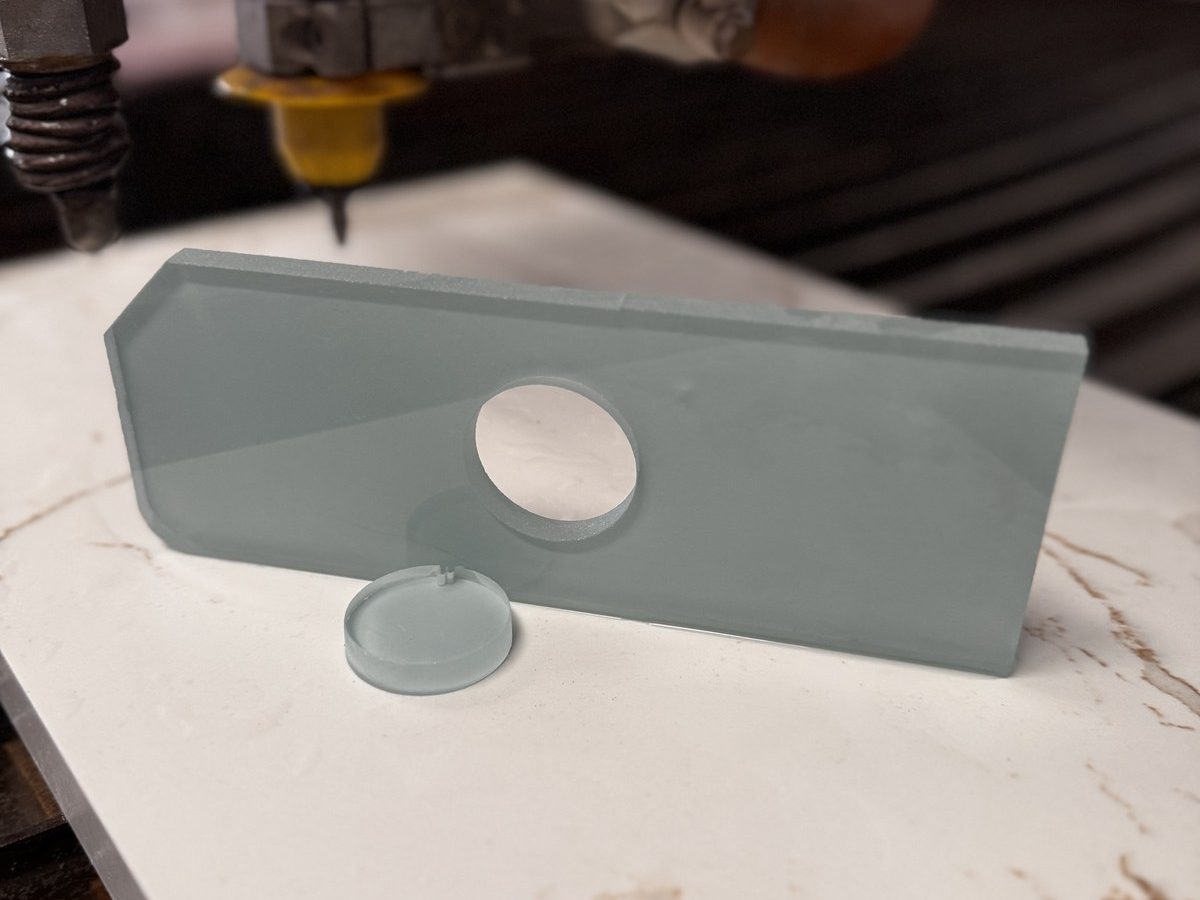 Industrial metal bracket precision-cut by waterjet for fabrication
