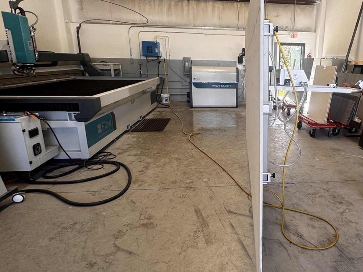 MotoJet intensifier pump pressurizing water to 60,000 PSI