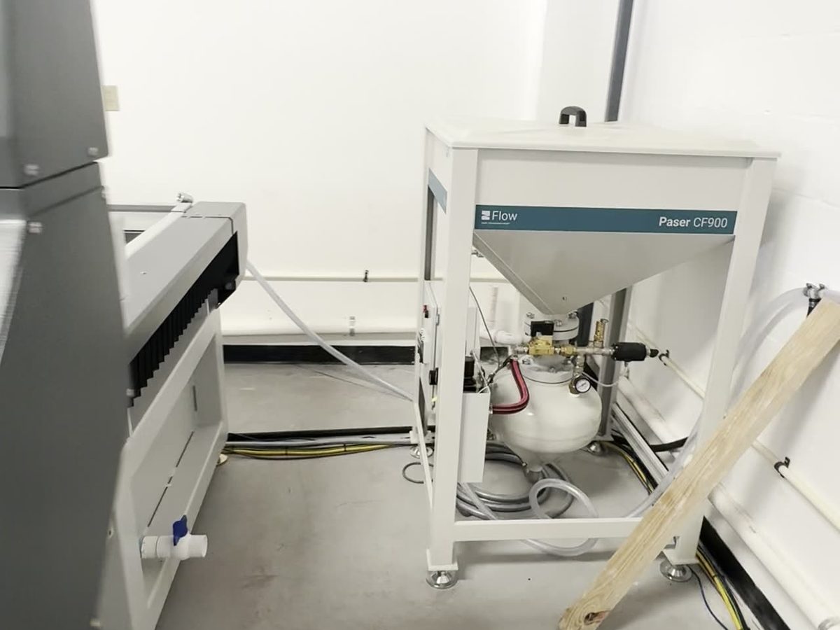 Paser CF900 garnet abrasive delivery system at MS WaterJet shop
