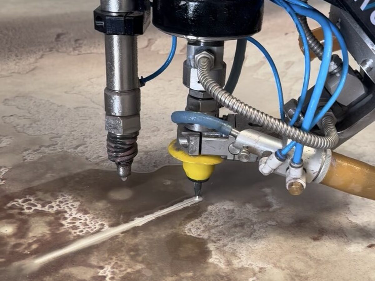 Extreme macro view of the Pivot+ waterjet cutting head